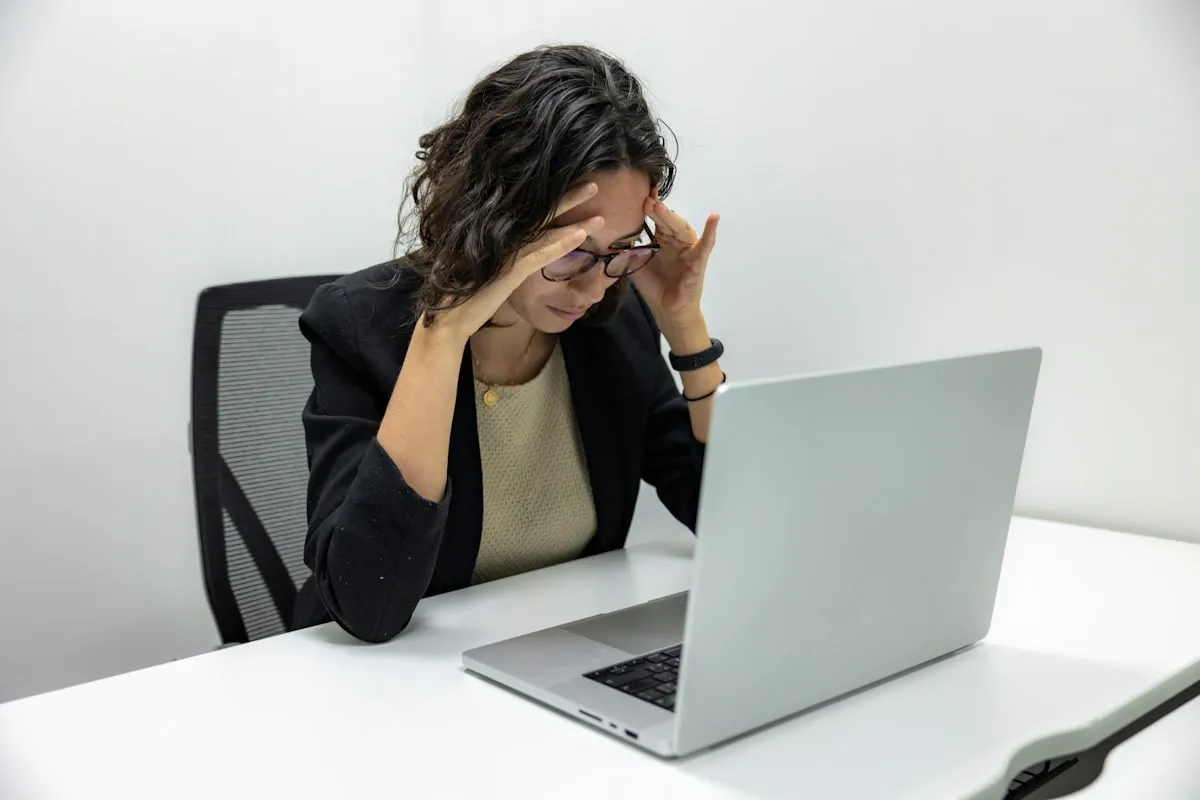 Woman experiencing brain fog and difficulty concentrating at work in Los Angeles