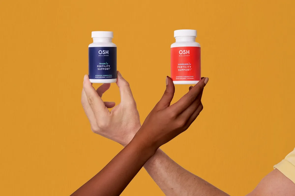 Woman holding vitamin supplement bottles comparing delivery methods for skin health