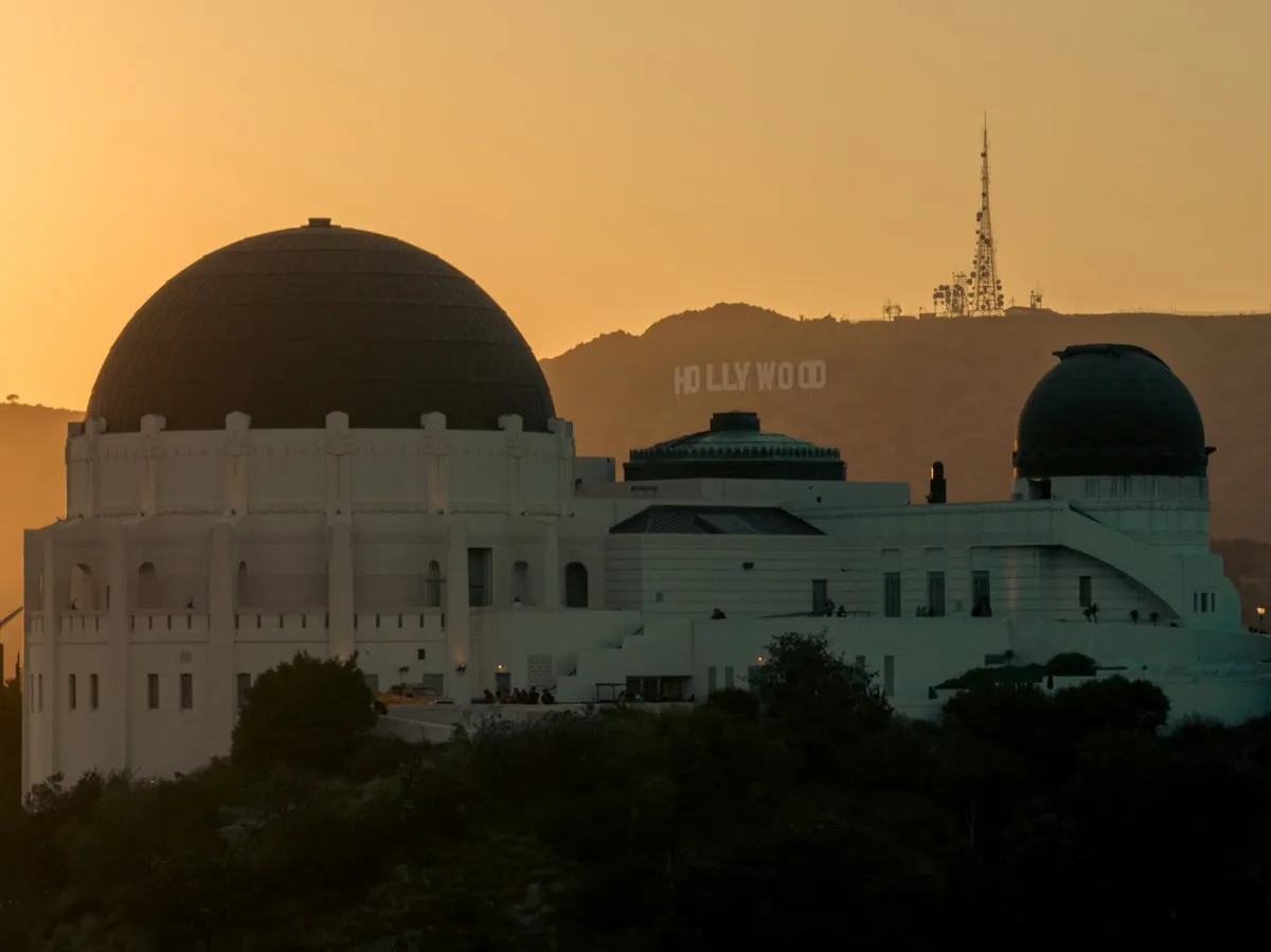 Griffith Observatory at sunset overlooking Los Angeles from Los Feliz neighborhood