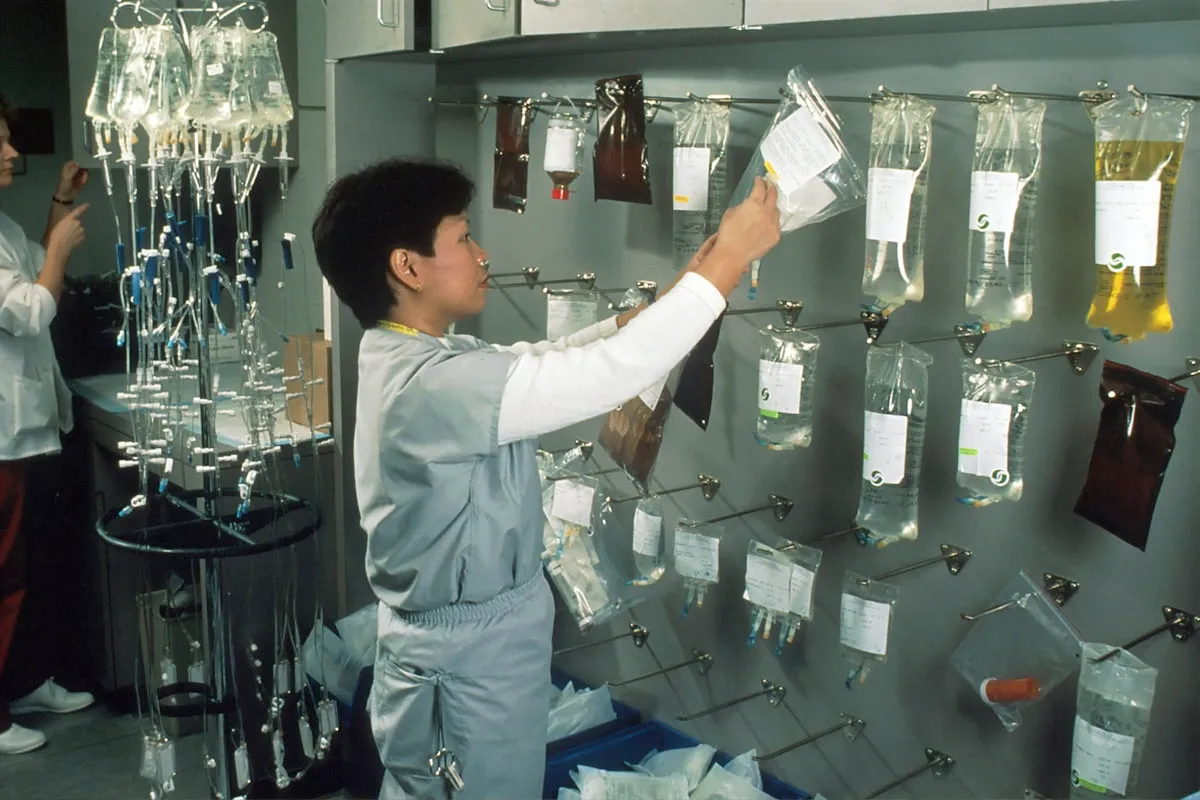 Nurse preparing IV therapy bags for mobile treatment in Pasadena California
