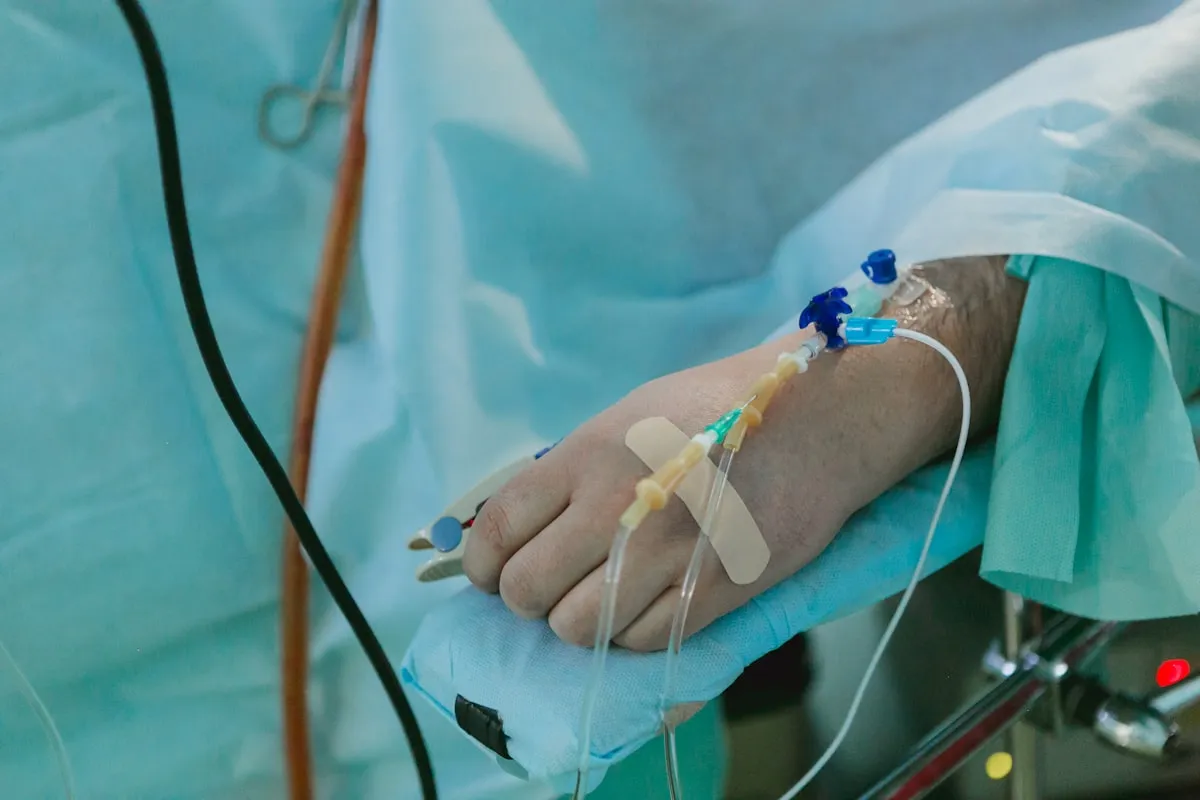 Patient receiving an IV infusion therapy session in a comfortable setting