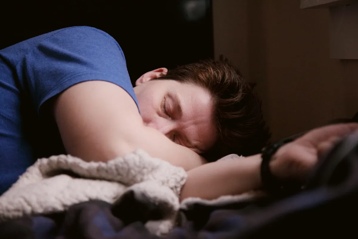 Woman lying in bed feeling tired and fatigued in Los Angeles